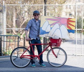 New York Bicycle Portrait: Jeremy carrying a painting home on his bike